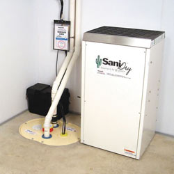 Sump pump system, dehumidifier, and basement wall panels installed during a sump pump installation in Georgetown