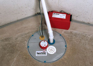 A sump pump system with a battery backup system installed in Tillsonburg