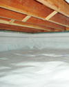 a moisture barrier installed on the walls and floors of a crawl space in Welland