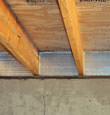 SilverGlo™ insulation installed in a floor joist in Stoney Creek