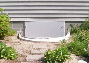 Rigid plastic crawl space access well installed in a Burlington crawl space