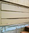 an old-fashioned crawl space door in Fort Erie about to be replaced