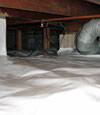 A Cambridge crawl space moisture system with a low ceiling