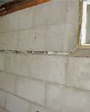 Severely buckling foundation walls in a home in Simcoe in need of repairs.