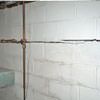 Severe foundation damage from a long crack in a bucking wall of a Georgetown home.