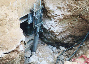 a bent, failed foundation push pier installed in Burlington.