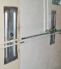 A foundation wall anchor system used to repair a basement wall in Tillsonburg
