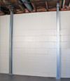 A steel i-beam system installed on a Delhi, Elora, Rockwood, Woolrich, Mapleton foundation wall