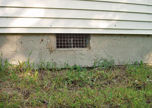 Open crawl space vents that let rodents, termites, and other pests in a home in Welland