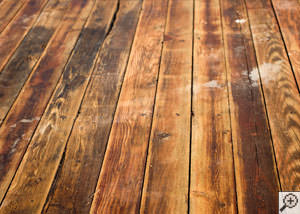 A Waterloo wood floor displaying water damage.