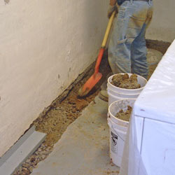 Digging a trench for a French Drain system in Hamilton