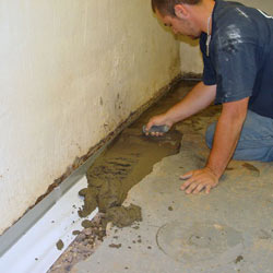 Testing a French drain system in a Waterloo home.