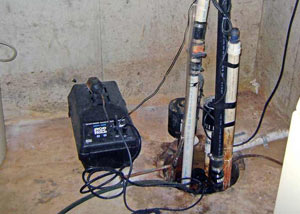Pedestal sump pump system installed in a home in Dundas