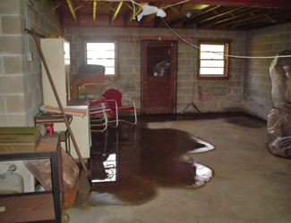 a flooded basement floor in a Acton home