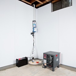 Sump pump system, dehumidifier, and basement wall panels installed during a sump pump installation in Georgetown