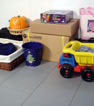 A concrete basement floor protected by our waterproof basement sub floor in Oakville, ON