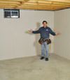 Cambridge basement insulation covered by EverLast™ wall paneling, with SilverGlo™ insulation underneath